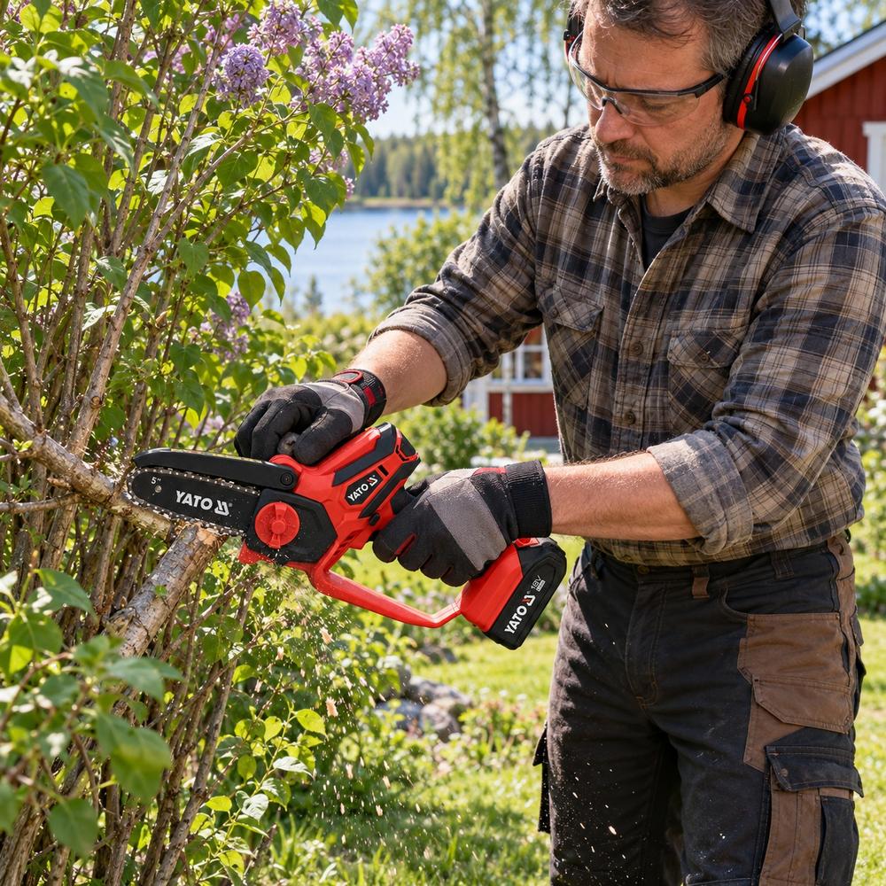 Yato akkuoksasaha 6" 18V 2 Ah AI Kuvituskuva – syreenipensaan rungon karsinta
